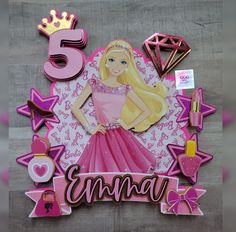 a birthday card with a barbie doll and crown on the top, surrounded by other decorations