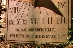 a sign on the side of a building that says, do not sounder time that is the stuff life is made of