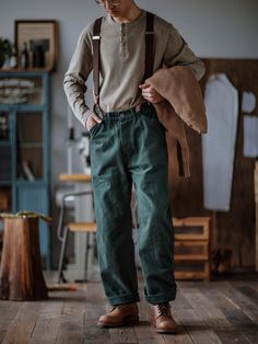 This is a classic straight-leg, mid-rise work pant with vintage buttons at the waist to match your American Western style backpack. It has been washed to give a slightly nostalgic look. The slightly relaxed fit is inspired by the '90s, and it's made from 100% cotton heavy twill fabric in your choice of two core colorways. FEATURES 100% cotton Heavy twill fabric Relaxed fit Zip fly Slant pockets Stone washed Style Number:099 SIZING & FIT Please carefully read the size info before purchase! Differ Aesthetic Man Clothes, Mens Goblincore, Farmer Style Men, Worker Outfit Men, Farm Outfit Men, Cottage Core Mens Fashion, Granola Boy Aesthetic Outfits, Suspenders Men Casual, Thick Men Fashion