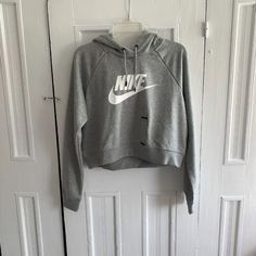 Nike Women's Hoodie Loose Fit Cropped 80% Cotton, 29=0% Polyester Nike Hooded Top For Loungewear, Nike Hooded Tops For Fall, Nike Loungewear Top With Drawstring Hood, Nike Tops With Drawstring Hood For Loungewear, Nike Fall Hoodie Top, Nike Long Sleeve Top With Drawstring Hood, Nike Long Sleeve Tops With Drawstring Hood, Nike Fall Hoodie, Tops Nike