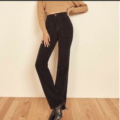 Reformation Daphne Corduroy Black Pants High Waist Flare Sz 31 NWT. New with tag Sold out Retail $148 Waist 32” Rise 12.5” Inseam 34” Fabric: Heavyweight stretch corduroy High-waisted, full length, flare silhouette Button closure and zip fly Slant front pockets and patch back pockets Shell: 99% cotton/1% elastane Crafted in cozy corduroy and showcasing a retro-inspired silhouette, these Reformation pants are a great pair to pick when you want to give you blue jeans a day or two off. Fall High-rise Corduroy Bottoms, High Rise Corduroy Bottoms For Fall, Chic Straight Leg Corduroy Jeans, Winter Corduroy Full Length Jeans, Winter Corduroy Full-length Jeans, Fall High Waist Corduroy Jeans, Fitted Wide Leg Corduroy Jeans, Fitted Mid-rise Corduroy Pants, Fitted Mid-rise Corduroy Jeans