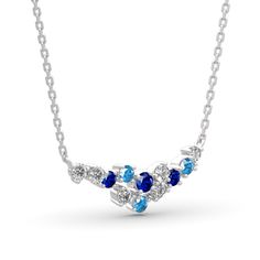 Dazzling with colour, this fashion necklace is certain to receive instant compliments. Created in sterling silver, this intriguing style showcases an array of stones - light blue, midnight blue and white stones - all placed along a curved bar design. Add this masterpiece to your jewelry box and you won't be disappointed.Carat Weight: 3.07 ctStone Size: 3,3.5,3 mmStone Type: Jeulia® StoneNumber of Stones: 12 Stone Shape: RoundStone Color: Diamond White, Aquamarine Blue, Sapphire BlueWeight: 2.1 g Blue Sapphire Pendant Diamond Necklace, Light Blue Sterling Silver Necklace, Light Blue Sterling Silver Necklace Fine Jewelry, Light Blue Diamond Necklace For Anniversary, Blue Stones Fine Jewelry, Fine Jewelry With Blue Stones, Blue Fine Jewelry With Stones, Fine Blue Jewelry With Stones, Light Blue Fine Jewelry Necklace For Anniversary