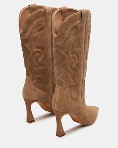 Experience the perfect blend of style and comfort with our HOLSTER bootie. Featuring a pointed toe and heeled design, this boot offers a chic western look while providing optimal support for your feet. Elevate any outfit with these versatile and on-trend boots. 3.25 inch heel height 14 inch shaft circumference 8.25 inch shaft height Suede upper material Synthetic lining Synthetic sock Synthetic sole Imported Pointed Toe Mid-calf Boots With Stacked Heel For Fall, Western Boots With Sculpted Heel For Fall, Western Wide Calf High Heeled Boots, Western Style Pointed Toe Knee-high Boots For Spring, Fall Boots With Reinforced Heel And Pointed Toe, Western Style Heeled Boots With Wide Calf, Western Style High Heel Boots For Wide Calves, Western Style Wide Calf Heeled Boots, Western Style Medium Width Heeled Boots For Work