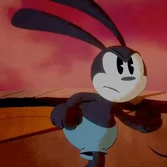 an animated rabbit is standing in front of a red sky