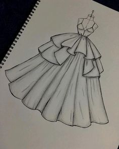 a drawing of a dress on paper