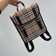 B's pure original plaid canvas backpack, very college-style, the bag is very square and will not collapse, the body of the bag is made of brand ECONYL retro plaid environmental protection canvas + smooth Italian tanned leather, the material is stiff Stylish, the upper body is super eye-catching. This material is known to be very wear-resistant and durable, similar to Prada's nylon material, and it is particularly resistant to wear, and it is OK to wipe it dirty. The hemming is sewn with leather Classic Coated Canvas School Bag, Coated Canvas School Backpack, Preppy Rectangular Backpack For Travel, Brown Rectangular Coated Canvas Backpack, Preppy Rectangular Travel Backpack, Rectangular Brown Coated Canvas Backpack, Rectangular Coated Canvas School Bag, School Backpack With Adjustable Strap In Coated Canvas, Classic Beige Rectangular Backpack