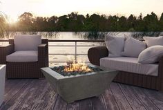 a fire pit sitting on top of a wooden deck