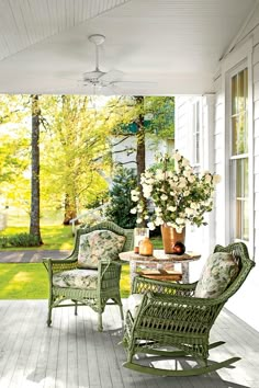 an image of a porch with rocking chairs and flowers on the front porch, text reads southern living magazine