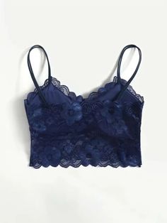 Indulge in unparalleled comfort with our Floral Pattern Lace Bralette. Embrace the freedom of wireless, medium-support lingerie that gently provides you with a relaxed fit. Meticulously crafted from intricate lace, it showcases a delicate scalloped design and a hint of stretch for a tailored fit. Enhance your everyday look with this enchanting bralette, effortlessly fusing simplicity with sophistication. Specifications: Details: Scallop Bra Type: Bralettes Wires: Wireless Lining Level: Molded S Lace Camisole With Lace Closure, Lace Camisole Bra With Lace Trim, Lace Cami With Lace Closure, Bra Friendly Lace Camisole, Elegant Lace Bra With Lace Top, Lace Camisole Bra Friendly, Lace Tops With Underwire And Bra Friendly Design, Lace Camisole Bra With Lace Top, Lace Camisole Top Bra