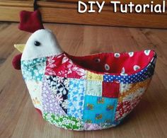 a chicken made out of patchwork material sitting on top of a wooden floor with the words diy tutorial written above it