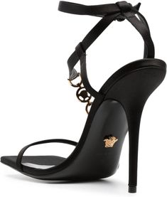 Step into luxury with these stunning sandals from Versace. The satin finish and Medusa plaque detail add an elegant touch to any outfit, while the high stiletto heel exudes confidence and style. With a buckle-fastening ankle strap and branded leather insole, these sandals are both fashionable and comfortable for all-day wear. 115mm high stiletto heel Satin finish and calf leather material Medusa plaque detail for added elegance Buckle-fastening ankle strap for a secure fit Branded leather insole Prada Designer, Toe Designs, Designer Sunglasses, Stiletto Heel, Watch Design, Leather Material, Satin Finish, Black Sandals, Calf Leather