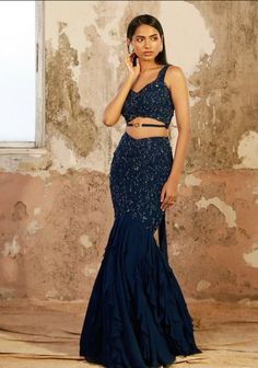 Ezra Blue Embellished Crop With Ruffled Skirt - S Images may be subject to copyright. Learn More Fish Lehenga Style, Fish Style Dress, Kalki Fashion Gowns, Fish Lehenga, Shloka Khialani, Fish Cut Skirt, Fish Cut Lehenga, Fish Cut Gown, Gown Poses