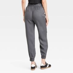 These High-Rise Jogger Pants from Universal Thread™ are made from lightweight lyocell fabric and tailored with a relaxed leg style to keep you in absolute comfort. The full elastic waist with drawstring offers an adjustable, secure fit, while the side pockets provide space for stashing everyday essentials. In a solid hue, they are easy to coordinate with a variety of tops for versatile wear. Universal Thread™: Found exclusively at Target. Versatile Straight Leg Viscose Bottoms, Versatile High-waisted Viscose Pants, Versatile Tapered Leg Pull-on Sweatpants, Relaxed Fit High-waisted Viscose Pants, Versatile Tapered Leg Sweatpants, High-waisted Relaxed Fit Viscose Pants, Versatile Ankle-length Pull-on Sweatpants, Versatile Pull-on Bottoms For Daywear, Versatile Spring Cargo Pants For Elevated Casual Wear