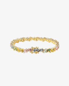 Elegantly crafted, this Frenzy Sapphire Tennis Bracelet features 6.60 carats of baguette-cut pastel sapphires, seamlessly paired with 1.07 carats of radiant round white diamonds. Each element of this exquisite piece is meticulously set in 18K gold, embodying the essence of charm and luxury. Details 18k yellow gold 6.60 carats of pastel sapphire baguettes 1.07 carats of round white diamonds Bracelet measures 7" inches in length Box clasp with safety lock fastening 5mm width Ref: AKB485 Sapphire Tennis Bracelet, Diamonds Bracelet, Luxury Details, Box Clasp, Jewelry Tray, Baguette Cut, Tennis Bracelet, White Diamonds, Diamond White