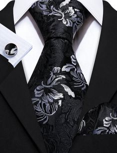 This Black White Floral Silk Tie Pocket Square Cufflink Set is the perfect addition to any formal wear ensemble. Made with high quality silk, this tie features a sophisticated black and white floral pattern that will make a statement at any wedding or special occasion. The set also includes a matching pocket square and cufflinks for a polished, put-together look. 100% Silk Handmade Package Includes: Tie, Pocket Square & Cufflinks. Length: 59" Width: 3.34" Warm iron if needed Black And White Floral Pattern, Cufflink Set, Black And White Floral, White Silk, Tie And Pocket Square, Silk Ties, Pocket Square, Formal Wear, Cufflinks