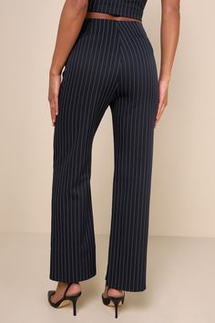 Step into the workweek feeling on top of your game in the Lulus Confident Appeal Navy Blue Pinstripe High Rise Pants! Slightly stretchy woven fabric features a pinstriped pattern throughout as it shapes a high waist and a hidden zip fly with top clasp closure. Sleek silhouette continues with straight legs that end at ankle-length hems. Functional side pockets and decorative welt pockets at back. Pair with the matching top for a complete look! Fit: This garment fits true to size. Length: Floor le Pinstripe Wide Leg Bottoms For Business Casual, Pinstripe Straight Leg Bottoms For Business Casual, High Waist Bottoms With Vertical Stripes For Business Casual, Pinstripe Straight Leg Business Casual Bottoms, High Waist Vertical Stripes Bottoms For Business Casual, Fitted Pinstripe High Waist Bottoms, Fitted High Waist Pinstripe Bottoms, Straight Pants With Vertical Stripes For Business Casual, High Waist Pinstripe Bottoms For Business Casual