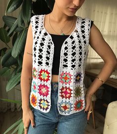 White Fitted Bohemian Vest, White Handmade Sleeveless Crochet Top, Handmade White Sleeveless Crochet Top, Handmade Casual Vest, White Crochet Vest For Spring, Casual White Festival Vest, Casual White Vest For Festivals, White Handmade Crochet Top, White Bohemian Crochet Vest Top