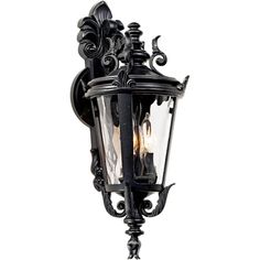 an outdoor wall light with two lights on the front and side of it, in black