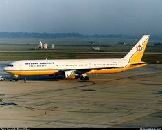 an airplane is sitting on the tarmac waiting for passengers to get on or off