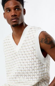 Accent your summer style with the PacSun Sweater Vest, a versatile staple for any wardrobe. Featuring a classic v-neckline and sleeveless design, it offers a lightweight feel with its woven knit fabrication and soft cotton blend. Perfect for layering or wearing solo, it adds a touch of sophistication to any warm-weather ensemble.V-necklineSleevelessStandard fitWoven knit100% CottonMachine washableModel is wearing size mediumModel Measurements: 6'1â Height, 31â Waist, 32â Inseam PacSun Mens Sweater Vest - Ivory size Medium Sweater Vest Outfit Mens, Crochet Sleeveless Sweater, Pacsun Sweater, Mens Sweater Vest, Modeling Outfits, Pacsun Sweaters, Sweater Vest Outfit, Proper Cloth, Pacsun Mens