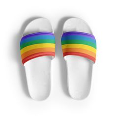 Rainbow LGBTQ+ Women's Slides. A must-have for the summer: these women's slides. A pair of these will keep you comfy throughout your day of beach or pool activities, thanks to the cushioned upper strap and the textured footbed.  * Cushioned and durable faux leather upper strap * Lightweight polyurethane (PU) outsole * Contoured, textured footbed * Spot clean only * Printed, cut, and handmade * Blank product sourced from China Important: This product is available in the following countries: United States, Canada, Australia, United Kingdom, New Zealand, Japan, Austria, Andorra, Belgium, Bulgaria, Croatia, Czech Republic, Denmark, Estonia, Finland, France, Germany, Greece, Holy See (Vatican city), Hungary, Iceland, Ireland, Italy, Latvia, Lithuania, Liechtenstein, Luxemburg, Malta, Monaco, Ne Casual Slip-on Flip Flops With Round Toe, Multicolor Slip-on Slides For Summer, Beach Slip-on Non-slip Slippers, Non-slip Slip-on Beach Slippers, Summer Flat Non-slip Slippers, Summer Slip-on Low-top Sandals, Slip-on Low-top Summer Sandals, White Summer Slippers For Leisure, White Summer Leisure Slippers