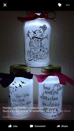 three mason jars decorated with hand painted labels and ribbons are stacked on top of each other