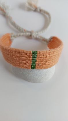 100% my hand woven bracelets are unique textile jewelry which is self produced by me. I design and create my jewelry in my home. My yarns are cotton, linens, silk, metalic yarns. Makes you breathe. Every bracelet is made in order to fit on any wrist. You can wash it by hand if needed using soap solution.  Width: 1cm  1,5cm,2cm   Length: weaving part is 13cm , 15 cm from one end to the other.            Free shipping. International shipping usually takes 10-14 business days from the package is sh Handmade Orange Friendship Bracelets For Everyday, Orange Handmade Friendship Bracelets, Handmade Orange Braided Bracelets In Bohemian Style, Orange Handmade Bohemian Braided Bracelets, Handmade Bohemian Orange Braided Bracelet, Handmade Orange Bohemian Braided Bracelet, Casual Handwoven Bracelets For Gifts, Orange Bohemian Braided Bracelets As Gift, Orange Woven Jewelry As A Gift