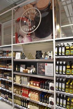 a store with shelves filled with different types of condiments