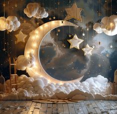 an image of a night scene with stars and moon hanging from the sky above clouds