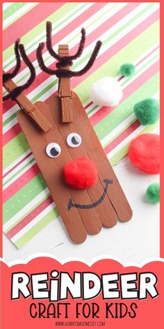 reindeer craft for kids made with popsicle sticks and yarn on the nose is shown