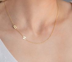 "This couple initial name necklace (Sideways Initial Necklace, Gold Spaced Letter Necklace ) is perfect Christmas gift for women or partner birthday gift! Also, this gold couple initial name necklace would make a great gift for mother birthday, engagement, anniversary, graduation, bridal shower or a treat for you! Trendy and timeless, this dainty sideways initial necklace has been produced with high quality 925k solid silver and available in silver, gold and rose gold colour. You can personalised your jewellery any initial(s), birthstone(s) or charm(s). FEATURES: *available in rose, gold & silver colour * chain in different lengths * great for daily wear * hypoallergenic * nickel-free, lead-free & cadmium-free * handmade in the UK * arrives in gift box * can include your gift message (leav Yellow Gold Initial Necklace For Birthday, Gold Initial Necklace For Anniversary Gift, Birthday Initial Pendant Necklace With Clavicle Chain, Gold Initials Name Necklace For Birthday, Gold Initial Necklace With Custom Name For Anniversary, Initial Pendant Name Necklace With Clavicle Chain For Anniversary, Gold Letter Charm Necklace For Birthday, Gold Initial Pendant Necklace For Birthday, Gold Initial Necklace For Birthday