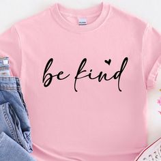 Show your support for kindness with our Be Kind T-Shirt. Perfect for Pink Shirt day, this shirt promotes positivity and compassion. Made with high-quality materials, it's comfortable and stylish. Wear it and spread the message of kindness. Festive Wallpaper, Pink Shirt Day, Clothing Studio, Moms Club, Gildan Sweatshirts, Sports Mom, Barbie Collection, The Message, Small Light