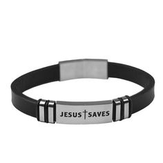 Handsomely crafted men's Jesus Saves Bracelet from Kerusso®Genuine black leather strapPremium stainless steel engraved with small cross and Jesus SavesHigh-quality engraving8 3/4 length Black Bracelets With Engraving Option, Silver Bracelet With Black Band In Stainless Steel, Adjustable Silver Leather Bracelet With Engraving Option, Adjustable Black Jewelry With Engraved Text, Silver Stainless Steel Bracelet With Black Band, Adjustable Black Bracelet With Engraving Option, Father's Day Black Stainless Steel Wristband, Father's Day Engraved Black Wristband, Classic Silver Leather Bracelet With Black Band