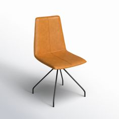 an orange chair sitting on top of a metal stand