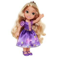 a doll with blonde hair wearing a purple dress and holding her hand up in the air