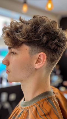 2024’s Best Low Taper Fade Haircuts for Men: 27 Trendy Styles to Elevate Your Game High Fade With Quiff, Curly Mid Fade Haircut Men, Middle Part Textured & Layered Flow W/low Taper, Mid Taper Wavy Hair, Popular Boy Haircuts, Side Fade Haircut Men, Low Taper Fade With Textured Fringe, Mid Taper Flow Haircut, Low Taper Textured Fringe