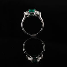 Beautifully designed diamond ring with emerald center stone. Item #JP-R0022 Metal: 14K White Gold Weight: 4.1 Grams Total Diamond Weight: Approximately 0.20 ct. Diamond Color: H Diamond Clarity: SI1 Gemstone Weight: Approximately 1 ct. emerald Ring Size: 6.5 (sizable) This ring can be sized for a $50 fee! *Please note that we cannot accept returns on sized rings* Measurements: 7.99 x 5.93 mm Layaway: For your convenience, we will be happy to provide layaway payment options. Please contact us to Emerald Ring Brilliant Cut For Proposal, White Gold Brilliant Cut Emerald Ring For Proposal, Emerald Ring With Vvs Clarity Round Cut, Emerald Ring With Diamond Center Stone For May Birthstone, Emerald Ring With Brilliant Round Cut For Proposal, Platinum Emerald-cut Diamond Ring For May Birthstone, Emerald Asscher Cut Ring With Vvs Clarity, Emerald Diamond Ring For May Birthstone With Center Stone, May Birthstone Emerald Ring With Diamond Center Stone