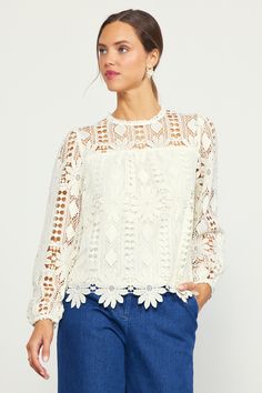 Crafted from embroidered open-eyelet lace, this long-sleeve blouse has lots of textural richness. It's got a floral motif woven in, creating a standout scalloped hem. The airy top features a round neckline and a back keyhole that's fastened by a loop button at the interior. •Round neckline •Long sleeves •Partially lined •Back keyhole with button •Relaxed fit Item Number: 45924 100% POLYESTER