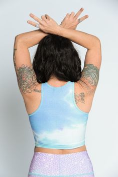 The Teeki Mermaid Tanks are cut with a high neckline and razor back crop top. They can be layered and offer gentle compression for low-impact workouts, yoga, swimming, and everyday layering. Fit: The single layer of lightweight fabric offers a gentle compression for low impact activities and daily use. Move freely in yoga class, by the pool, in the ocean, or layering without the discomfort of tight elastic bands, thick materials and underwires. If you have a small chest size the fit may not be t We Love The Earth, Mermaid Tank, Recycled Water Bottles, Yoga Crop Tops, Love The Earth, Eco Friendly Clothing, Summer Pants, Yoga Fashion, Best Leggings