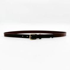 Crafted from rich brown Italian leather, this narrow belt offers a warm, sophisticated touch to any outfit. The solid brass buckle enhances its classic design, making it a versatile accessory for both casual and formal looks. With its minimalist appeal, the Millie Belt is a must-have for those who appreciate quality and understated elegance. Proudly made in California, it embodies the essence of Streets Ahead’s dedication to craftsmanship and enduring style. Details: Material: Chocolate brown It Brown Workwear Belt With Brass Buckle, Brown Belt With Brass Buckle For Work, Elegant Everyday Brown Belt, Elegant Brown Belt For Everyday, Classic Belt Buckles For Workwear, Classic Adjustable Belt With Brass Buckle, Classic Adjustable Belt Buckles For Workwear, Elegant Brown Belt Buckles With Brass Buckle, Formal Brown Belts And Suspenders With Brass Buckle