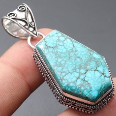 Coffin Turquoise Gemstone Pendant Necklace Pendant Gemstone Vintage Style Pendant Gift For Her Sterling Silver Plated Jewellery Gift For Him Materials Sterling Silver Plated Pendant Size 2.1 x 1 Stone Name Coffin Turquoise Color- Sky Blue Shipping Policy We do ship through DHL, UPS, INDIA POST. I make the gemstones myself for my valued customers so I assure you that the gemstones are Natural and are made from ethically sourced roughs. The rest of the pendant is made from 925 Sterling silver Plat Nickel Free Turquoise Rectangular Jewelry, Turquoise Jewelry With Large Stone As Gift, Turquoise Jewelry With Large Stone For Gift, Turquoise Gemstone Rectangular Pendant Jewelry, Turquoise Stone Jewelry As A Gift, Turquoise Stones Jewelry Gift, Turquoise Jewelry With Stones For Gifts, Turquoise Jewelry With Stones As A Gift, Bohemian Turquoise Necklace With Large Stone