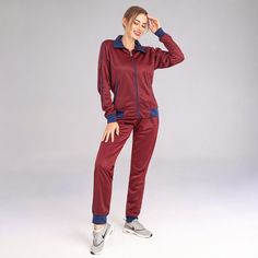 This women's 2-piece tracksuit features a comfortable track material suitable for any age and all sorts of casual and sports activities. Tracksuits have always been in mainstream fashion trends and the elegant color combinations has made this 2-piece tracksuit a top choice for every day activewear. Many traditional outlets do carry trimmed jogger track pants with full zip up track jackets but not many carry a matching 2-piece jogging outfit. This matching 2-piece jogging outfit is available in regular sizes from XS to XL and also plus size are available as 2XL and 3XL. Rest assured that these jogging suits run true to size and offer a relaxed and comfortable fitting for all ages. Specifications: Jogger style track pants Full zip up track jacket with 2 zippered side pockets Matching 2-piece Elegant Color Combinations, Jogging Suits, Jogging Outfit, Joggers Track Pants, Jogging Suit, Elegant Color, Fashion Joggers, Tracksuit Women, Sports Activities