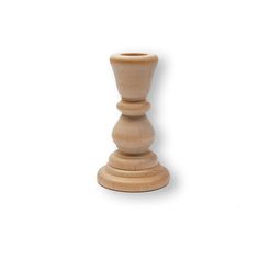 a wooden candle holder on a white background