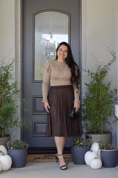 Lennon features a brown faux suede, in a knife pleat and elastic waistband. Dress it up or wear it casual! Modeled in large, and paired with our new Ashlyn knit top. 90% Polyester/10% Spandex Small (waist 28-30"/length27") Medium (waist 30-32"/length 27") Large (waist 32-34"/length 27") Brown Pleated Skirt For Night Out, Stretch Skirt For Date Night In Fall, Brown Stretch Skirt For Fall, Fall Brown Pleated Skirt With Pleated Hem, Brown Pleated Skirt With Pleated Hem For Fall, Chic Brown Pleated Skirt For Winter, Fall Pleated Skirt With Elastic Waistband, Casual Pleated Skirt For Fall Day Out, Brown Skirt For Fall Night Out