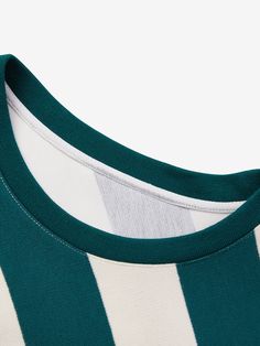 Details: Retro chic dark green striped sweatshirt Loose oversize fit Classic round neck, cozy and simple Green and white twill, retro chic Loose hemline Materials & Care: Top layer: cotton 99.0% spandex 1.0% Bottom layer: polyester 100% Hand wash | Dry clean Do not bleach Size & Fit: Model is 5'7", Bust 32, Waist 24, Hips 35, wearing a size S Item #: EL3SW08 Cotton Striped Sweatshirt With Striped Cuffs, Green Crew Neck Top With Three Stripes, Green Horizontal Stripe Crew Neck Top, Green Crew Neck Tops With Contrast Stripes, Green Crew Neck Top With Contrast Stripes, Simple Green, Chic Me, Retro Chic, Green Stripes