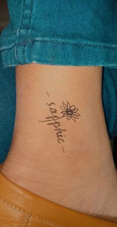 sunflower tattoo with gay propaganda Lesbian Small Tattoo Ideas, Tattoo Ideas Lesbian Couple, Lesbian Minimalist Tattoo, Small Lesbian Tattoos, Saphicc Tattoo, Sapphic Tattoo Minimalist, Bi Tattoos For Women, Gay Tattoo For Women