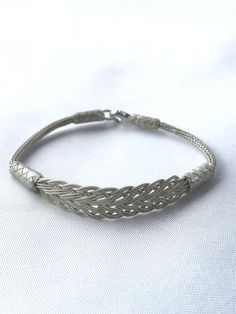 Unisex Silver Braided Bracelet, Silver Unisex Bracelet, Unique Braided Bracelet, Braided Unisex Bracelet, Silver Bracelet for Her and Him Make yourself or your loved ones happy with this beautiful braided bracelet. This woven bracelet jewelry complete your style with a special touch. Color: Silver Size: Choose size in drop-down menu. Material: 1000 Carat Silver Technique: Kazaziye silver jewelry made by hand with only 1000 carat silver or 24 carat gold. A strand of 1000 carat silver or 24 carat Elegant Braided Sterling Silver Bracelet, Elegant Braided Bracelet Jewelry, Traditional Adjustable Chain Bracelet With Sterling Silver Clasp, Elegant Sterling Silver Braided Bracelet, Formal Adjustable Braided Bracelets, Formal Adjustable Braided Bracelet, Elegant Braided Bangle Bracelet With Sterling Silver Clasp, Elegant Braided Sterling Silver Bracelet Gift, Traditional Silver Braided Bracelet With Jubilee Style