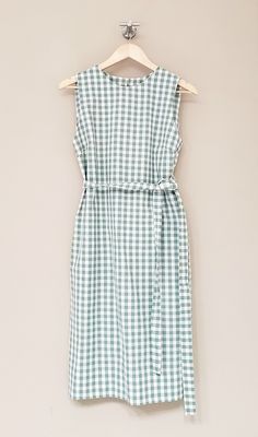 "Gingham sleeveless Dress / Handmade by littleflowerfabric / 100% Cotton Dress / Lightweight / Pullover / Handmade STYLE * Fits neatly across the shoulders. * Gentle, shape that floats subtly away from the body. * No zipper, pullover. * Right above bust including armhole up to neckline is lined with the same fabric as blouse for fit. DETAILS * Made with Cotton 100%, 140 gsm * Manufacturer: Fableism Supply Company * Collection: Camp Gingham PLEASE NOTE * Made to order. Hand made. Neither returnable nor exchangeable. * All garments are approximate as to be expected with the handmade. PLEASE CHECK * The measurements carefully. (Especially the body BUST measurements) The most important thing is the measurement of the bust size. FIT * Order your usual size. * Model wears Small size / Model 5' 5 Chic Cotton Sleeveless Dress For Garden Party, Fitted Casual Sleeveless Dress For Picnic, Chic Gingham Cotton Dresses, Cotton Sleeveless Sundress For Garden Party, Green Cotton Sleeveless Dress For Spring, Vintage Sleeveless Dress For Picnic, Fitted Sleeveless Dresses For Picnic, Gingham Sleeveless Dress For Picnic, Gingham Cotton Dresses For Day Out