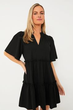 Black Crepe Crawford Dress Black Casual Tiered Dress With Ruffles, Black Dress With Ruffle Hem And Sleeve, Black Ruffle Sleeve Dress For Summer, Chic Tiered Dress With Ruffled Skirt And Short Sleeves, Black Dress With Ruffle Hem And Ruffle Sleeve, Short Sleeve Tiered Dress With Ruffle Hem For Brunch, Black Mini Dress With Ruffle Hem And Sleeves, Chic Flowy Tiered Dress With Short Sleeves, Black Ruffle Dress With Ruffle Hem And Sleeves