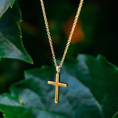 A sleek modern gold Cross necklace. Handcrafted in NYC with 18kt certified Fairmined Ecological gold that is toxic chemical free, sustainable, ethical and clean. Chain is 16" 18kt Fairmined gold. Please allow 3-4 weeks from your order date to be manufactured and ready to ship.Worldwide shipping. Free shipping within USA.Embrace newness. Purity is the new luxury. Cheap Minimalist Cross Pendant Necklace, Yellow Gold Clavicle Chain Necklace With Cross Pendant, Minimalist Gold Chain Necklace With Cross Pendant, Minimalist Gold Plated Cross Necklace, Gold Minimalist Tarnish Resistant Cross Necklace, Minimalist Yellow Gold Cross Pendant Jewelry, Yellow Gold Necklace With Delicate Chain And Cross Pendant, Gold Minimalist Cross Pendant Jewelry, Minimalist Yellow Gold Cross Necklace With Clavicle Chain